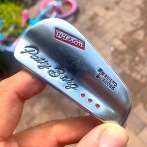 Wilson Patty Berg vintage golf iron in RH
With leather grip